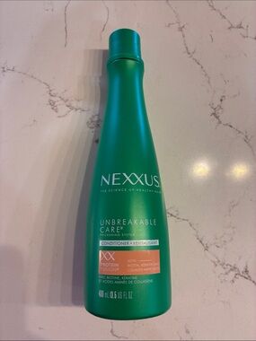 Nexxus Unbreakable Care Hair Conditioner. New. 13.5 oz bottle.